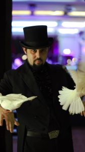 The Magician Marco cardoso magic with some doves